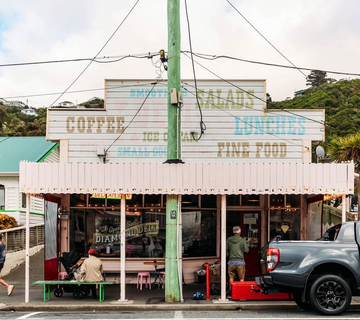 Building exterior of Queen Sally's Diamond Deli in Lyall Bay Wellington