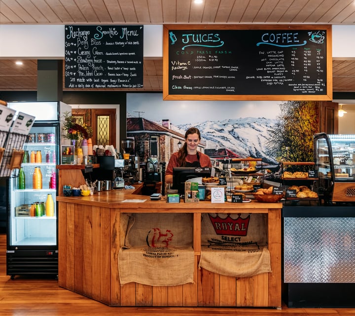 Front counter, cabinet and coffee machine at Recharge Bar & Cafe.