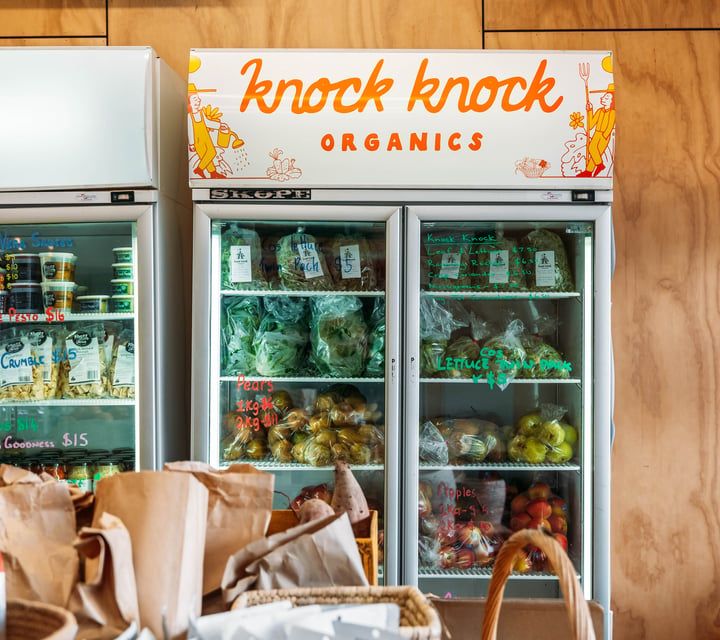 A refrigerator full of organic produce.