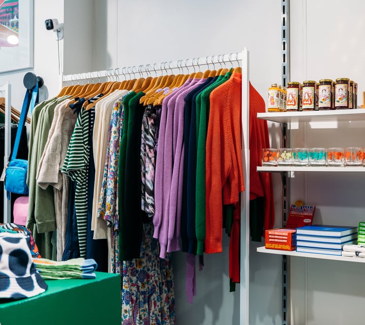 Colourful clothes and candles displayed inside Wanda Harland in Petone.
