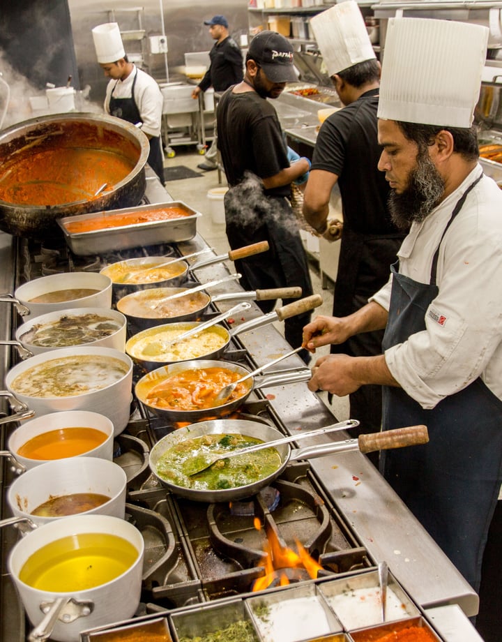 Chefs working inside the kitchen at Paradise in Auckland.