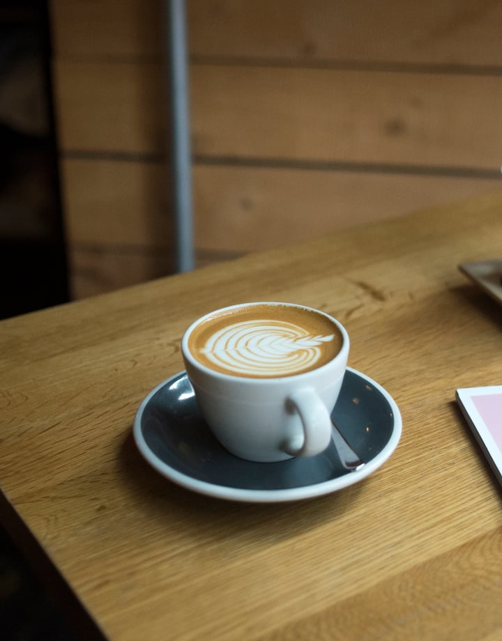 A coffee on a table.