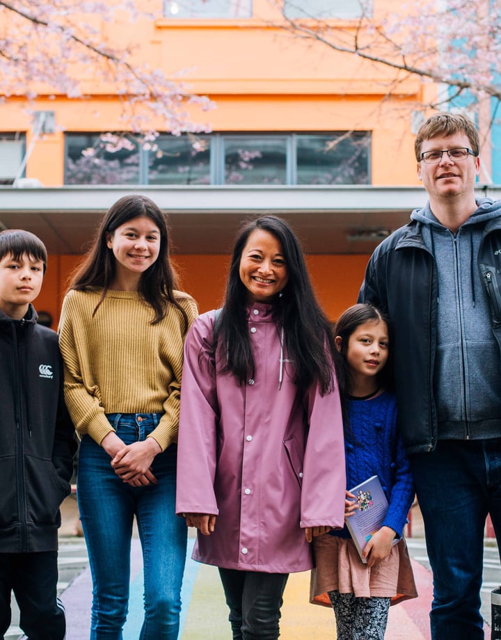 Mahalee and Benoit with their family on the streets of Palmerston North.