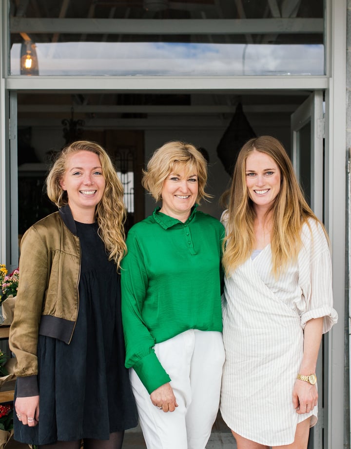 Anna Begg of the Workroom Caravan with two other women.