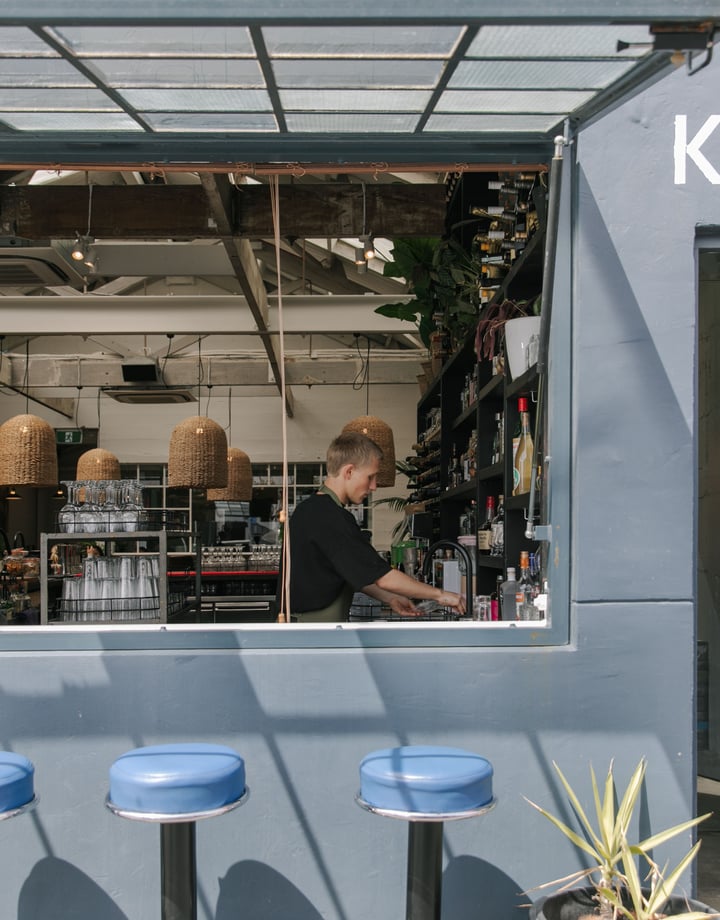 A large window looking into Kokomo cafe and restaurant in Christchurch.
