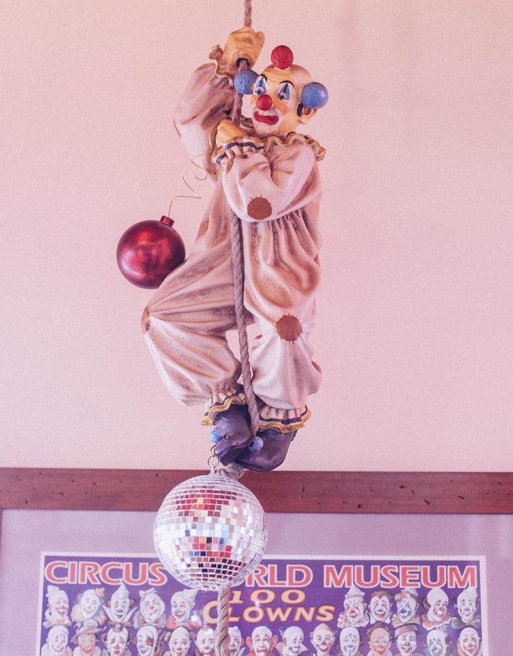A clown hanging from the ceiling at Circus Circus.