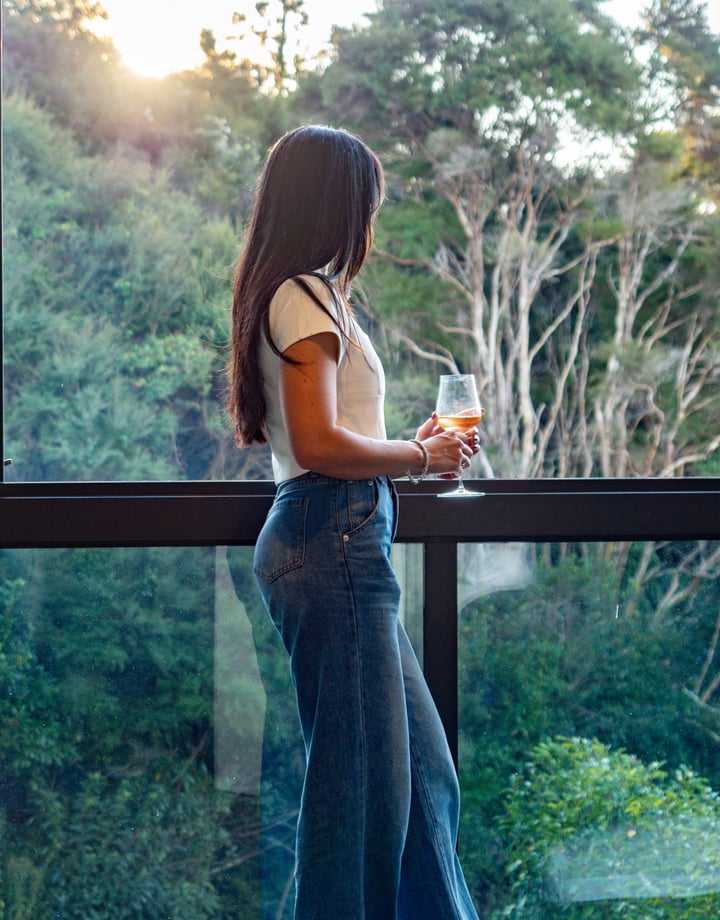 Guest looking at the view from the balcony.