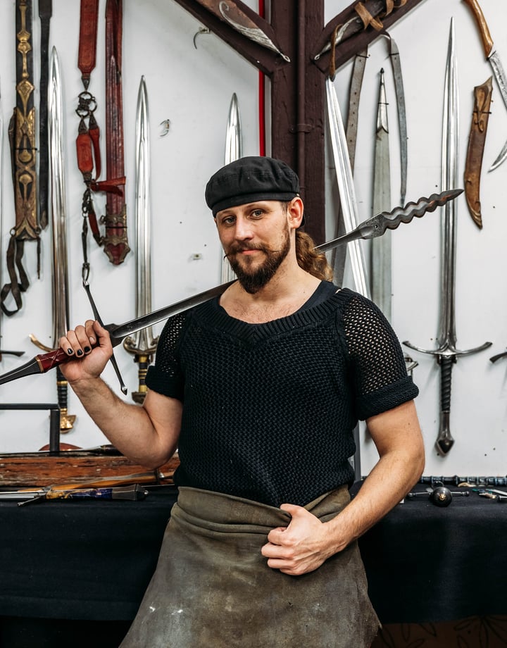 A man holding a sword.