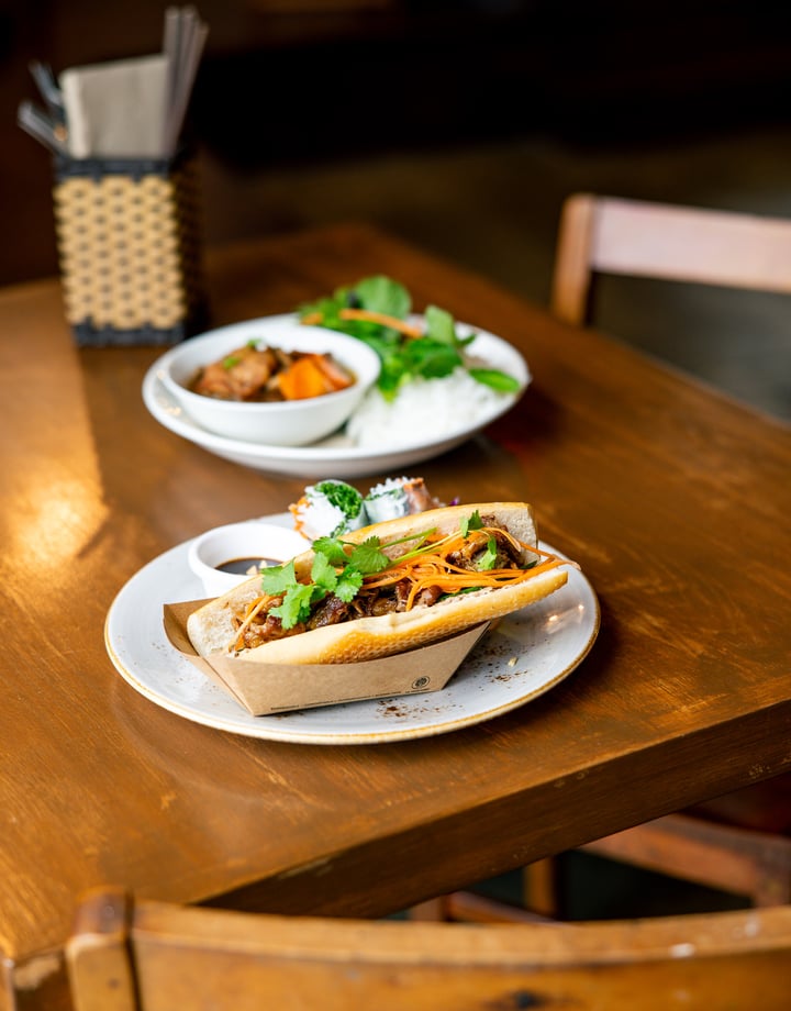 A banh mi on a table.