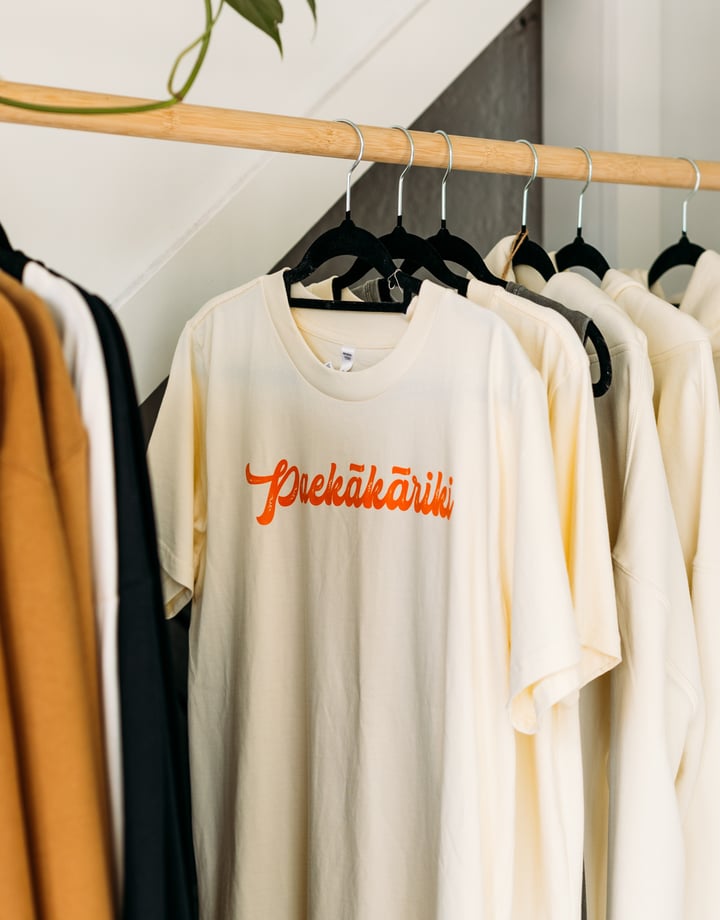 A t-shirt with 'Paekākāriki' printed on the front.