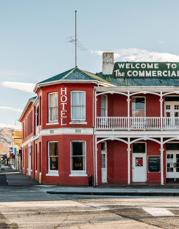 A red Roxburgh building on a sunny day.