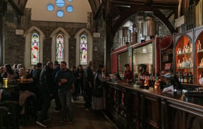 The busy bar inside The Church Pub.