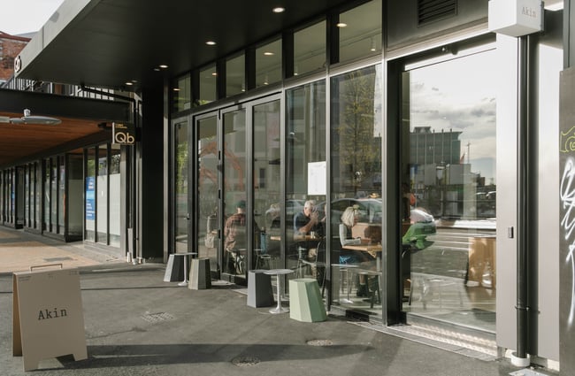The glass exterior of Akin Cafe in Christchurch.