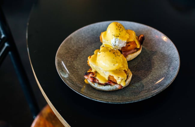 Eggs benedict on a table.