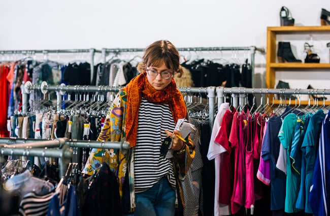 A customer looks for clothes at Recycle Boutique, Hamilton.