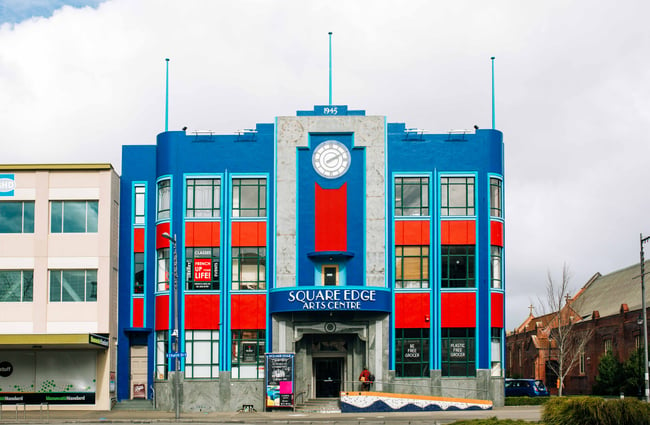 The exterior blue and red building.