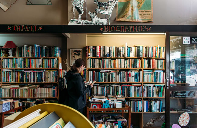 A customers browsing books inside the store.