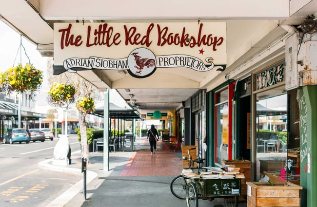 The exterior signage of The Little Red Bookshop in Hastings.
