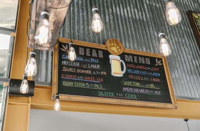 Blackboard with beer options at Golden Bear Brewing Company, Māpua Tasman.