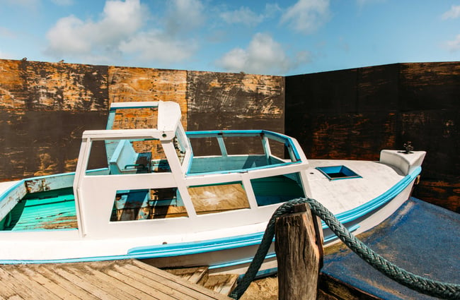 A blue and white boat on display outside at Punnet Eatery.