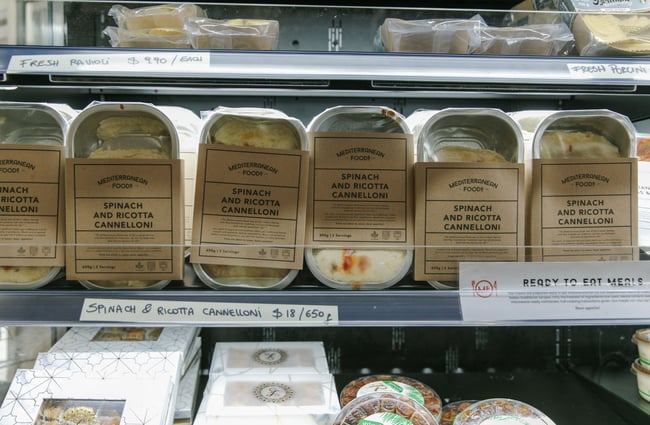Ready-to-eat packaged meals of spinach and ricotta cannelloni in the fridge at The Mediterranean Food Company, Christchurch.
