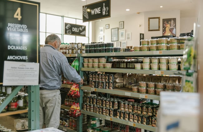 A man browses an aisle of European goods at The Mediterranean Food Company, Christchurch.