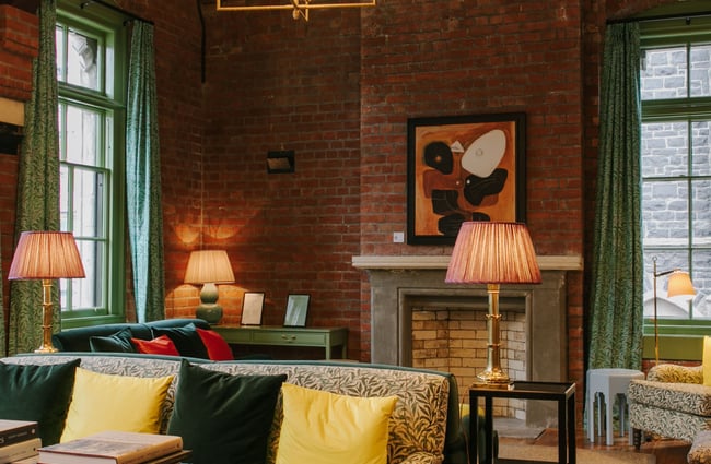 Vintage modern living room with gold chandelier.