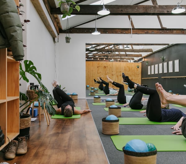 A pilates class in action at Well Studio.