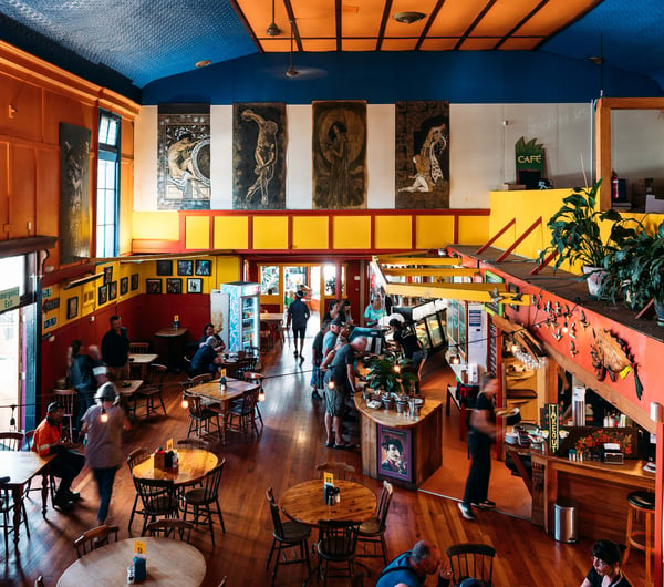 A brightly coloured cafe interior.