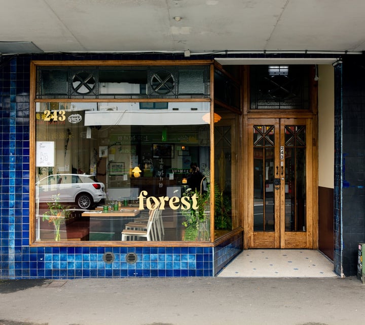 The blue and wooden exterior of Forest restaurant in Auckland.