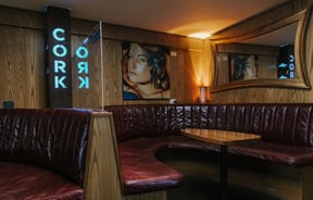 Brown leather booth seating at Cork, Wānaka.