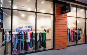 The full-height windows of the exterior of Ruby store in Christchurch.