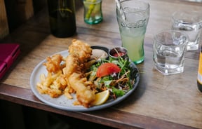 Fish and chips on a table.