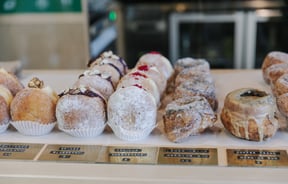 Row of donuts from Grizzly Baked Goods.