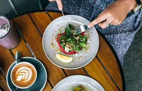 A flatlay of food and coffee at Local Authority cafe.