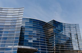 Exterior curved glass building of the Christchurch Art Gallery.