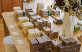 Selection of soaps on a table at Global Soap, Nelson.