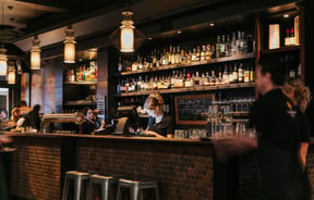 Staff working behind the bar at Harry's Hawker House.