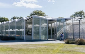 People walking into Ilex Café in Christchurch Botanical Gardens.