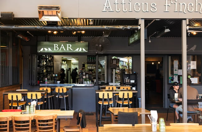 Exterior seating and bar counter at Atticus Finch.