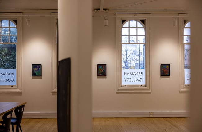 A view of the outside from inside the gallery.