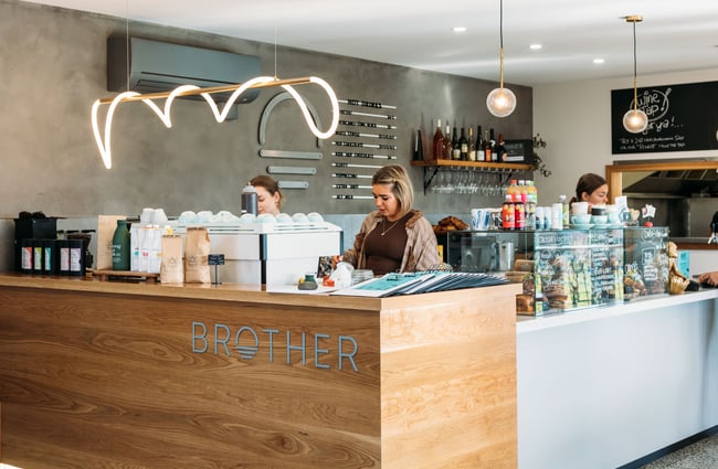 Staff members working behind the counter at Brother cafe in Hvaelock North.