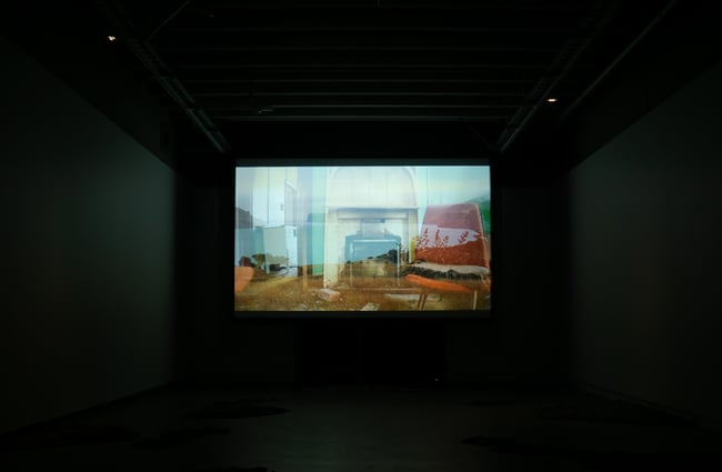 Image of a film playing inside CoCA.