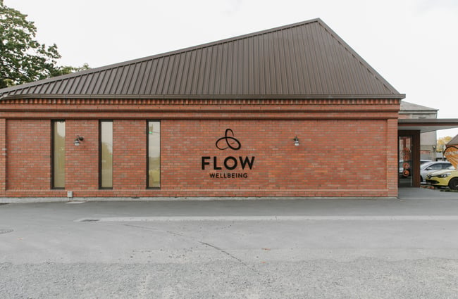 The brick exterior of Flow Wellbeing in Christchurch.