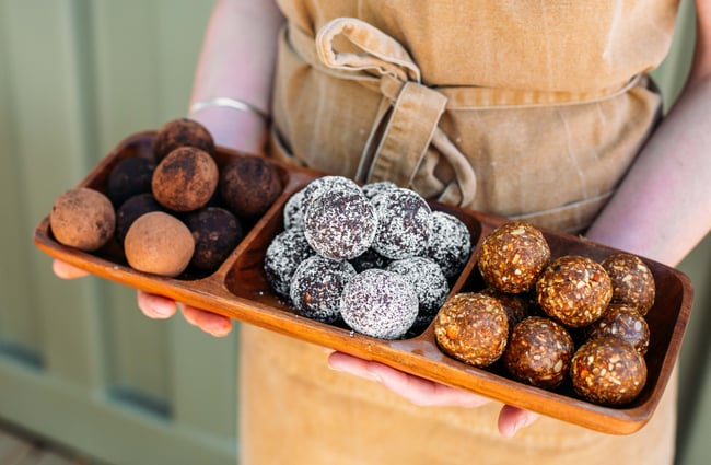 A range of bliss balls in a tray from Little Green Olive, Porirua.