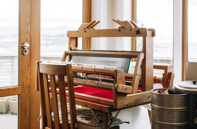 A wooden loom in the Niche Textile Studio.