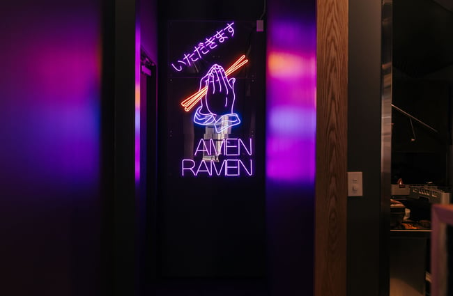 Amen Ramen purple neon sign.