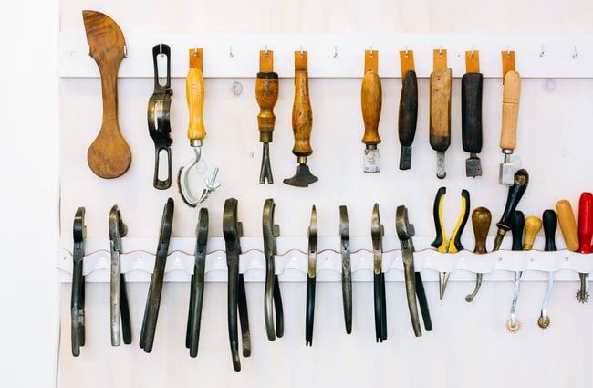 Tools hang in their slots at Shoe School, Wellington.