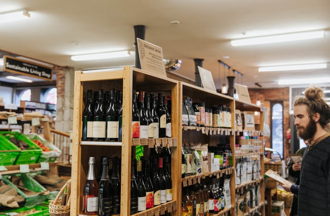 Wine bottles on shelves.