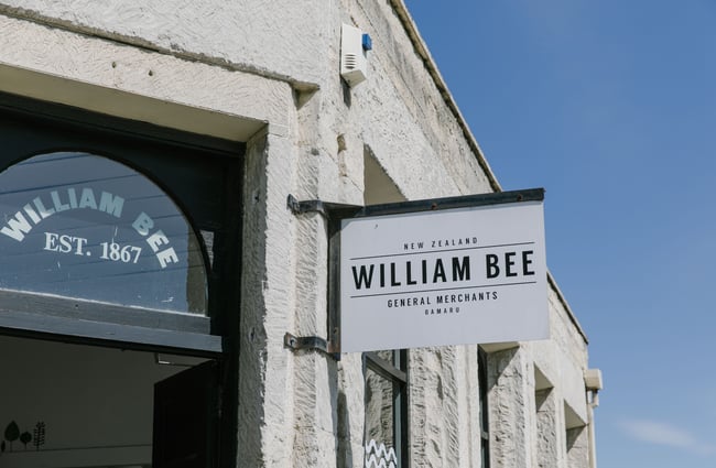 Exterior sign for William Bee store in Ōamaru.